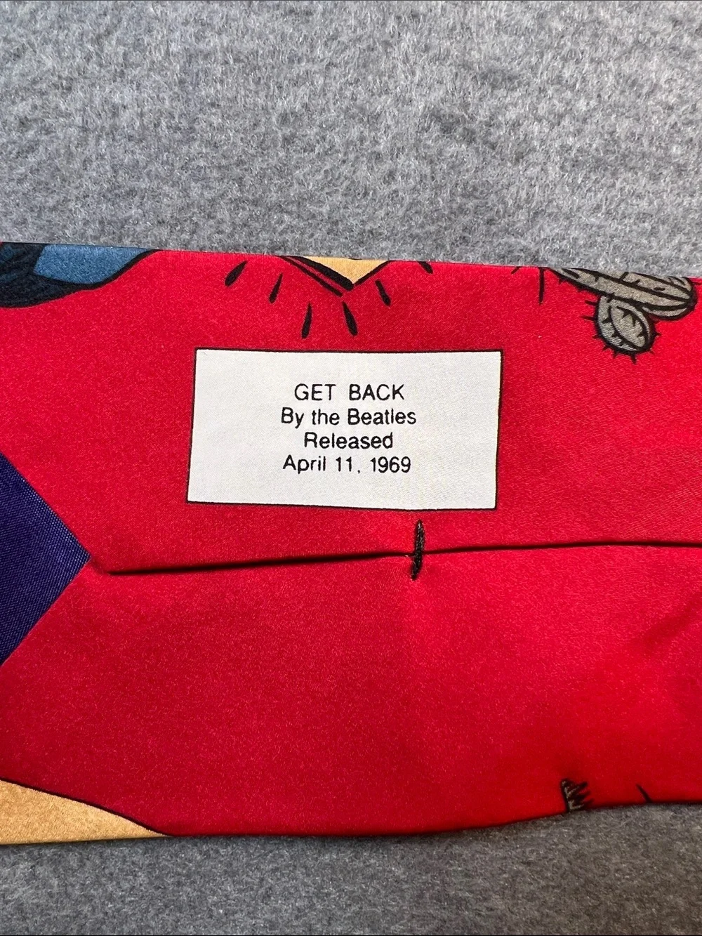 The Beatles ‘Get Back’ Red Silk Novelty Tie with Blue and Yellow Accents